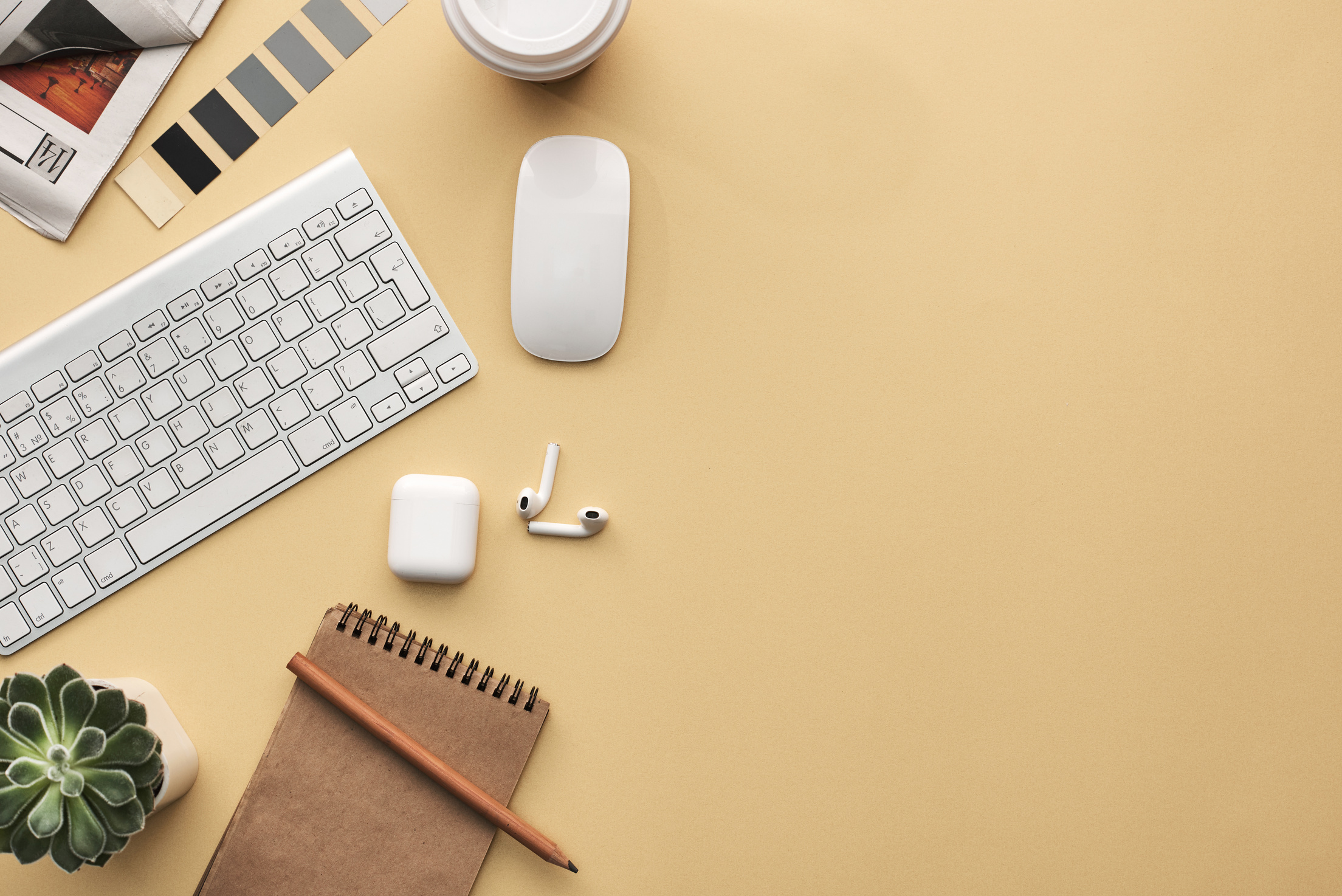 Keyboard and Mouse on Beige Background